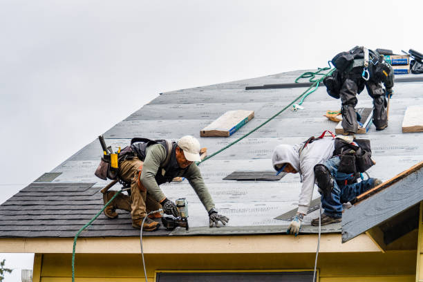 Professional Gutter Installation technician working in Vassar, KS